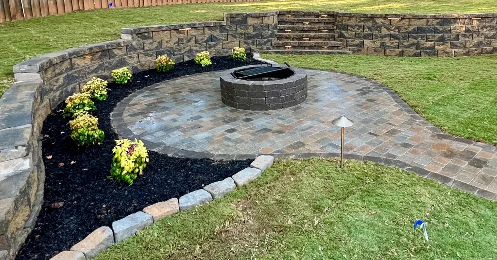 Quiett Scapes Hardscape retaining wall, Patio, and Fire pit