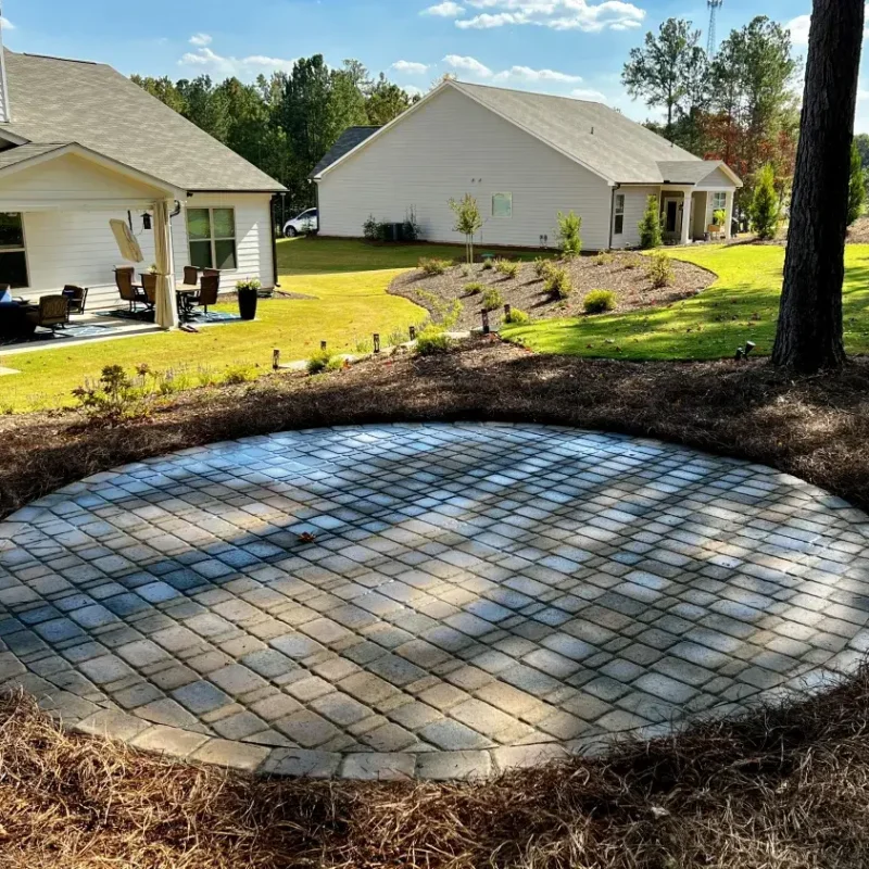 Round circle paver patio by Quiett Scapes